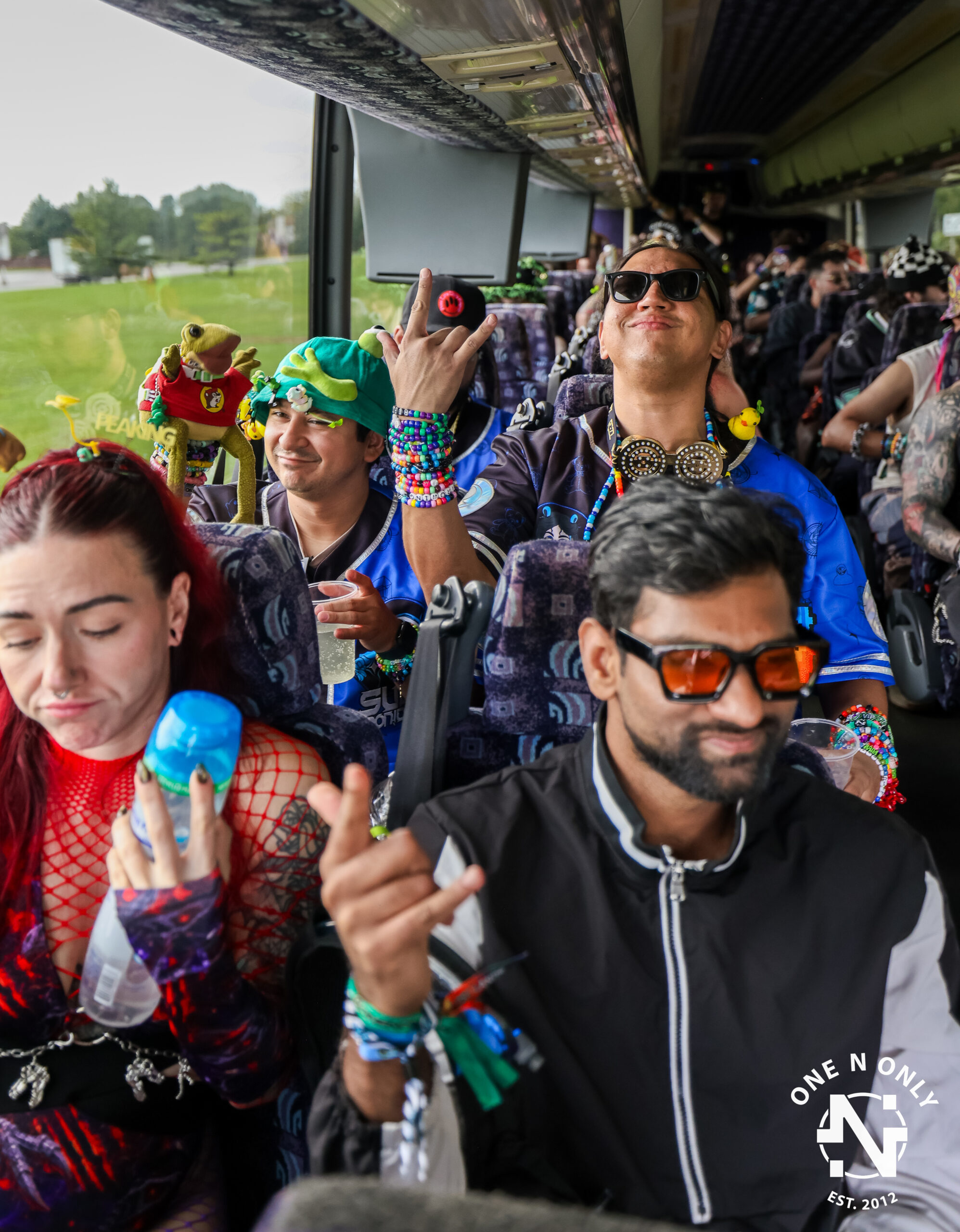 ONO festival travelers aboard a shuttle